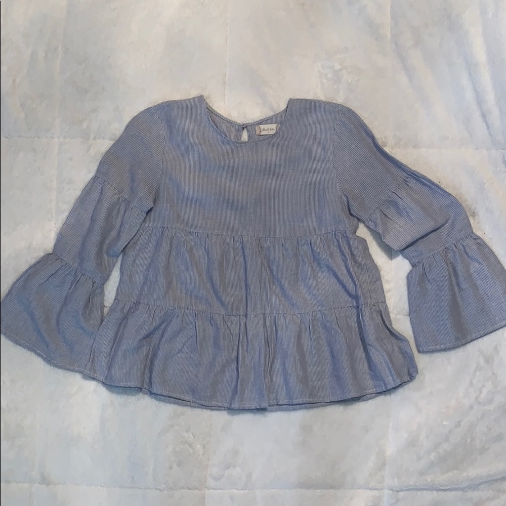 Striped long sleeve peplum top